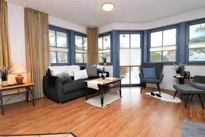 Image de Ferienwohnung mit Terrasse Direkt Hinter der DĂĽne nur Wenige Schritte zum Strand