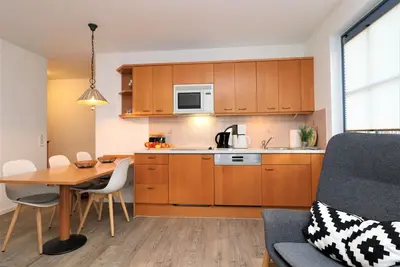 Image de Ferienwohnung Direkt Hinter der DĂĽne mit Ostseeblick vom Balkon