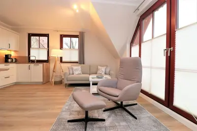Image de Vacation apartment directly behind the dune with sea view and beach chair on the beach