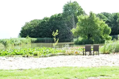 Image de Holzhaus am See, Am Kanal, Kamin, Sup, Angeln, Yoga