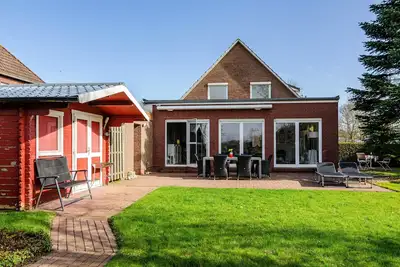 Image de Maison de vacances 'Leezdorf Ostfriesland' avec terrasse privée, jardin privé et Wi-Fi