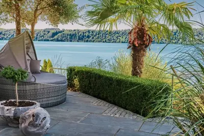 Image de Appartement \"Haus Seeblick\" avec vue sur le lac, terrasse privée et Wi-Fi