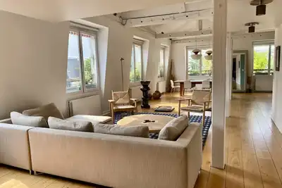 Image de loft spacieux avec terrasse central à côté du Marais