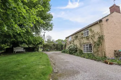 Image de The Cottage, character holiday cottage, with open fire in Holywell