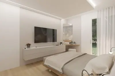 New family apartment with exclusive services and a beachfront pool.