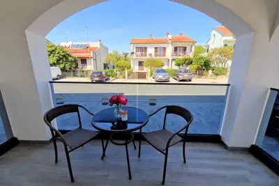Image de Studio près de la plage et du balcon