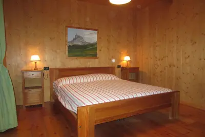 Appartement 'Villa Cleila Rossa A' avec vue sur les montagnes, jardin partagé et balcon