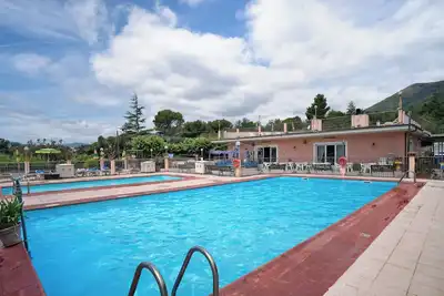 Image de Studio \"Monolocale Con Soppalco 43\" avec piscine partagée, terrasse privée et Wi-Fi