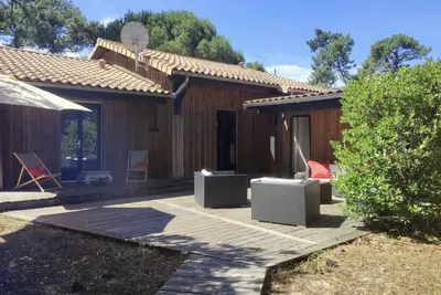 Image de Maison de vacances 'Maison Bois Proche Bassin Ref6' avec jardin privé et Wi-Fi