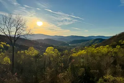 Image de Enchanting mountain home with deck views, private hot tub, firepit, & fireplace