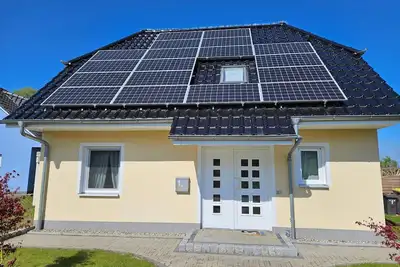 Image de Ferienpark Neppermin Ferienhaus Achterwasser - Ferienwohnung Eg im Haus Achterwasser