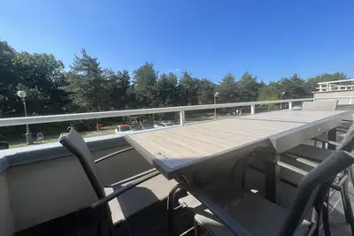 Image de Appartement avec vue sur la Pinède grande terrasse
