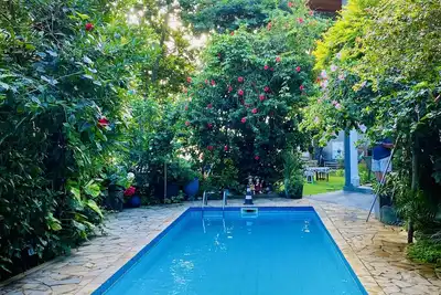 Image de Casa Aconchegante em Penha, pé na Areia, com Piscina e Quintal Arborizado
