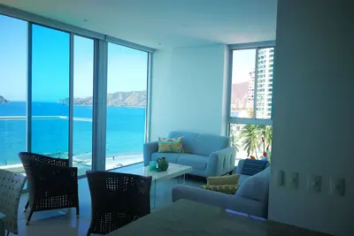 Image de Beach-front beautiful apartment, 3 ensuite double bedrooms (min 30 nights)