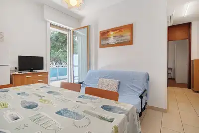 Image de Appartement 'Condominio Lara A16' avec terrasse privée et climatisation