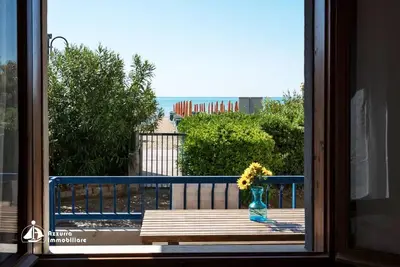 Image de Appartement 'Villa Ridente 02' avec vue sur la mer, terrasse privée et climatisation