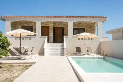 Anastasia Luxury House offers an idyllic escape combining modern luxury with traditional charm.