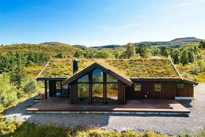 Image de Maison de vacances pour 8 a Tjørhom