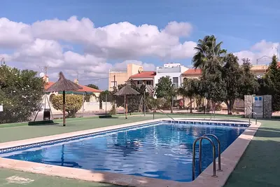 Image de Cozy bungalow-access to community pool. \nLa Marina beach 3km away