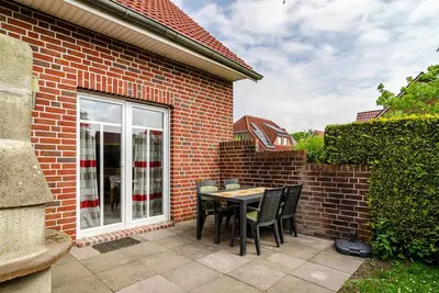 Image de Appartement 'Ferienhaus Seestern' avec terrasse privée, jardin partagé et Wi-Fi