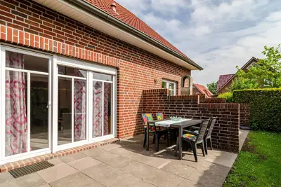 Image de Appartement \"Ferienhaus Seepferdchen\" avec terrasse privée, jardin partagé et Wi-Fi