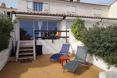 Image de Maison 4 pièces, 5 pers, climatisation, terrasse, 450m plage, animaux admis