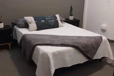 Image de Moderno y Acogedor Departamento Céntrico