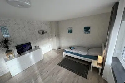 Image de Schlafplatz Huwald Pension Monteurzimmer Monteurswohnung Zentral Wifi