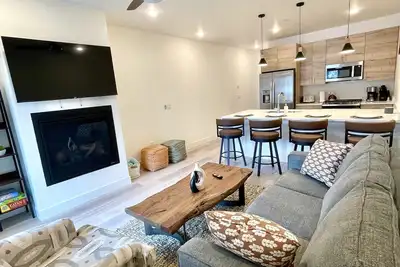 New! Luxury Riverfront Retreat with Mountain Views