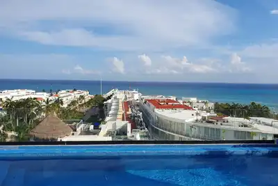 Image de CĂłmodo Estudio a 200 Metros de la Playa, Rooftop con Vistas IncreĂbles al Caribe