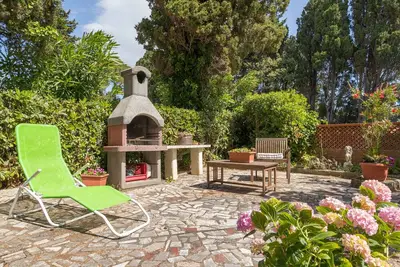 Image de Maison de vacances 'Castiglioncello Mare Apartment' avec terrasse privée, Wi-Fi et climatisation