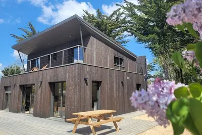 Image de Maison Moderne en Bordure de Forêt, Idéale pour 8\/10 Pers, à 2km de la Plage avec WiFi et Terrasse