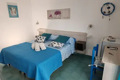 Image de Double Room with Patio in Residence a few steps from the sea