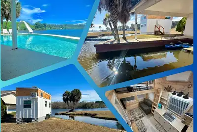 Lake Life Tiny House located on top of the water - Pool - 3 Kayaks - Beautiful!