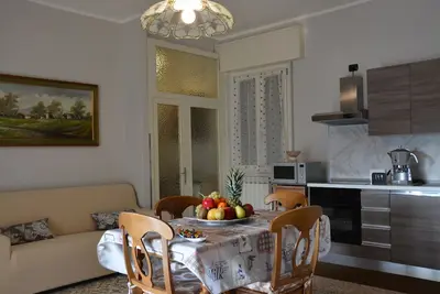 Image de Spacious apartment with panoramic terrace 10 minutes from Lake Iseo.