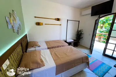 Image de Lindo Studio com Copa e Varanda à 150m da Praia do Perequê