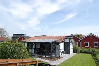 Image de Maison de vacances 'Ferienhaus Elb-diek' avec terrasse privée, jardin privé et Wi-Fi