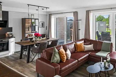 Image de Küstenbude in Nordseenähe mit Sauna, Terrasse, Parkplatz & Wlan