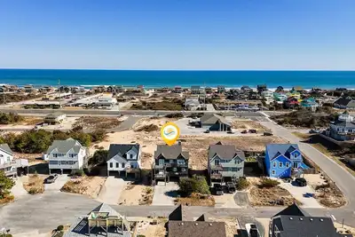 Image de 6133 Coastal Crave * 4 bedroom * New Hot Tub