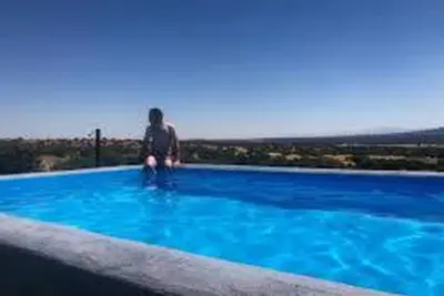 Image de Maison de vacances 'Cincosombreros' avec vue sur la montagne, piscine privée et Wi-Fi