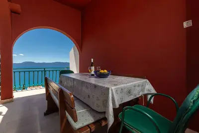 Image de Appartement de deux chambres avec la terrasse et la vue sur le mer Brist, Makarska (A-22463-c)