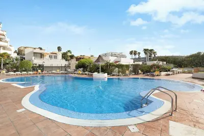 Image de Appartement de vacances 'Los Geranios 71' avec piscine partagée, terrasse privée et Wi-Fi