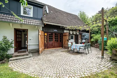 Image de Maison de vacances 'Ferienhaus S' Äckerle' avec terrasse et jardin privés