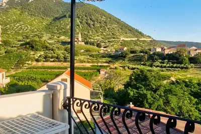 Image de Cozy 1-bedroom apartment with Ac, WiFi, parking, terrace view, laundry