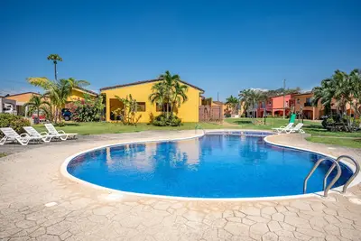 Image de Home in a gated community with outdoor pool, patio, grill, streaming, W\/D, & Ac