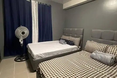 Image de Cozy studio condo with WiFi, Ac, washer in delightful Lapu-Lapu City