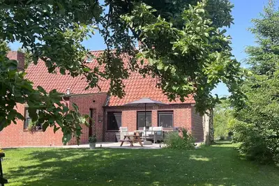 Image de Maison de vacances 'Urlaub An Der Elbmündung' avec terrasse privée, jardin privé et Wi-Fi