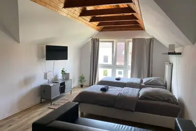 Image de 2 Zimmer Wohnung - KĂĽche Badezimmer - 4 Betten - Parkplatz - Wifi