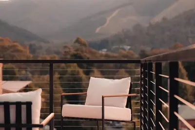 Image de Woodleigh Estate - Step into a world of timeless elegance and unparalleled charm at Woodleigh Estate. This historic 1860's home is nestled on a one acre estate landscaped with cottage like gardens. From the moment you enter the home you are envelope