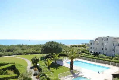 Image de St Cyprien Charmant appartement T2 avec Balcon et piscine en bord de plage